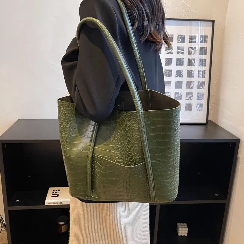 Imane | Vintage Umhängetasche aus braunem Leder mit Hakendruck